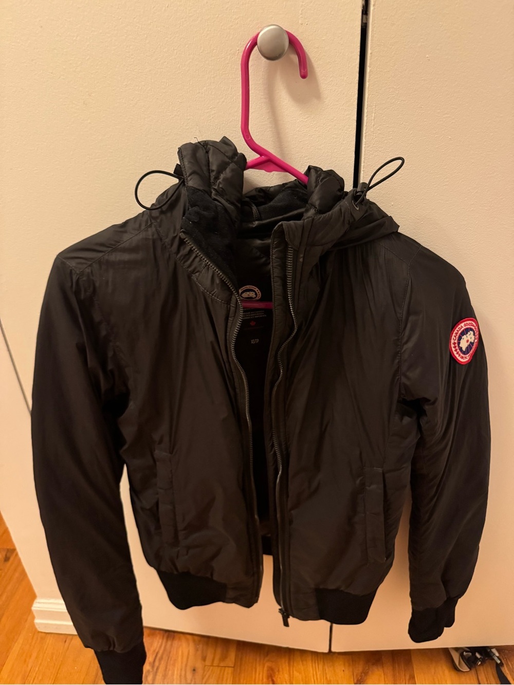 Canada Goose Black Jacket with Red & White Logo Patch